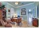 Elegant office space with ornate wooden desk, tiled floor, and custom built-ins at 2755 Via Capri # 1223, Clearwater, FL 33764
