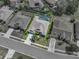 Bird's-eye view featuring a property with lush landscaping, a spacious layout, and a backyard pool, perfect for outdoor living at 2908 89Th E Ave, Parrish, FL 34219
