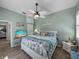 Inviting bedroom with beachy accents, coastal decor, and soothing wall color, creating a serene retreat at 2908 89Th E Ave, Parrish, FL 34219