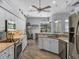 Bright kitchen with breakfast nook, granite countertops, and updated stainless steel appliances at 2908 89Th E Ave, Parrish, FL 34219