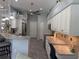 Spacious kitchen with granite countertops, wood-look tile flooring and updated appliances at 2908 89Th E Ave, Parrish, FL 34219