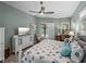 Inviting main bedroom with ensuite bath, hardwood floors, and lanai access at 2908 89Th E Ave, Parrish, FL 34219