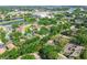 Aerial view showcases the community's lush landscape, waterways and convenient access to nearby highway at 2953 Yucca Ct, Palm Harbor, FL 34684