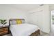 Comfortable bedroom with closet, bed, and flooring at 2953 Yucca Ct, Palm Harbor, FL 34684