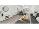 Open-concept living and dining area featuring modern furniture and decor at 2953 Yucca Ct, Palm Harbor, FL 34684