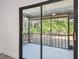 The screened lanai provides an indoor/outdoor space to relax and enjoy the scenery at 2953 Yucca Ct, Palm Harbor, FL 34684