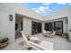 A serene outdoor balcony provides a relaxing retreat with cushioned chairs and a peek at the view at 4 Belleview Blvd # 802, Belleair, FL 33756