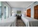 Charming bedroom with twin beds, hardwood floors, an artful painting and ample closet space at 4 Belleview Blvd # 802, Belleair, FL 33756