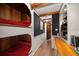 Unique bedroom featuring custom bunk beds, wood desk, and ship wheel decor at 4 Belleview Blvd # 802, Belleair, FL 33756