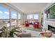 Bright living room features large windows to a balcony with beautiful views at 4 Belleview Blvd # 802, Belleair, FL 33756