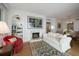 Inviting living room featuring a fireplace and a decorative rug at 4 Belleview Blvd # 802, Belleair, FL 33756