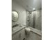 Bathroom features a modern sink, marble countertop, tiled floor, and a standing shower with a tiled wall pattern at 4022 Cortez Dr # A, Tampa, FL 33614