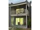 Two-story exterior featuring screened-in porches and sliding doors for outdoor enjoyment at 4022 Cortez Dr # A, Tampa, FL 33614