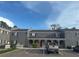 Exterior view of a townhouse showing parking and multiple units in complex at 4022 Cortez Dr # A, Tampa, FL 33614