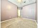 Spacious bedroom with plush carpet and neutral colors, featuring a ceiling fan at 4214 Canongate Ct, Spring Hill, FL 34609