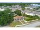 Aerial view of a home with a well-maintained lawn and surrounding landscaping at 4403 W Bay Court Ave, Tampa, FL 33611