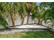 Fun backyard play area with a sandbox and swing set, perfect for children at 4403 W Bay Court Ave, Tampa, FL 33611