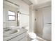 This bathroom features a single vanity, a toilet, and a shower at 533 E Curlew Pl # 533, Tarpon Springs, FL 34689