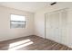 This cozy bedroom features a window and a closet at 533 E Curlew Pl # 533, Tarpon Springs, FL 34689