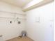 The laundry room is equipped with wire shelves at 533 E Curlew Pl # 533, Tarpon Springs, FL 34689
