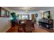 Bright and airy living space with elegant furnishings, wood floors, and water views at 7867 Sailboat Key S Blvd # 101, South Pasadena, FL 33707