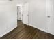 Bright bedroom featuring hardwood floors and a view into other rooms at 8065 70Th N St, Pinellas Park, FL 33781