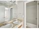Bathroom with double sinks and access to the toilet and shower area at 8101 Interbay Blvd # A, Tampa, FL 33616