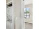 Stacked washer and dryer with access to the bedroom with natural light at 8101 Interbay Blvd # A, Tampa, FL 33616