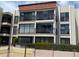 Close up view of a lovely building with multiple units and private balconies in a desirable location at 845 S Gulfview Blvd # 107, Clearwater Beach, FL 33767
