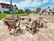 Outdoor community firepit with Adirondack chairs for lounging at 845 S Gulfview Blvd # 107, Clearwater Beach, FL 33767