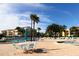 Community pool and spa area with seating and tables for residents at 845 S Gulfview Blvd # 107, Clearwater Beach, FL 33767
