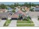 Lovely home with an attached garage, manicured front lawn, and mature landscaping at 8915 Hannigan Ct, Tampa, FL 33626