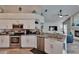 Well-appointed kitchen featuring stainless steel appliances, granite countertops, and an open view to the living space at 8915 Hannigan Ct, Tampa, FL 33626