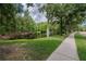 A peaceful pond with a water fountain adds charm to this park setting at 8915 Hannigan Ct, Tampa, FL 33626