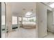 Large, sunny bathroom with a soaking tub, tile floors, a skylight, and lots of windows at 919 Sandpiper S Way, St Petersburg, FL 33707