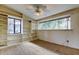 Bedroom with built-in shelving and large windows at 919 Sandpiper S Way, St Petersburg, FL 33707