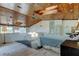 Main bedroom loft with skylight and ceiling fan, offering bright natural light at 919 Sandpiper S Way, St Petersburg, FL 33707