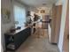 Bright kitchen features modern appliances, custom cabinets, and a butcher block island at 11376 119Th Ter, Largo, FL 33778