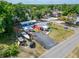Bright red home features ample parking and grassy front yard at 126 Ridgewood Ave, Brandon, FL 33510