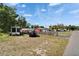 Property includes ample parking, a trailer, and boat, with a partially fenced yard at 126 Ridgewood Ave, Brandon, FL 33510