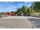 The building stands out with its ample parking space and the green backdrop of trees at 126 Ridgewood Ave, Brandon, FL 33510