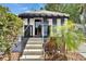 Charming home featuring a welcoming entrance with well-maintained landscaping at 126 Ridgewood Ave, Brandon, FL 33510
