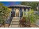 Charming home featuring a welcoming entrance with well-maintained landscaping at 126 Ridgewood Ave, Brandon, FL 33510