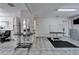 Grooming room with tiled floors, mirrors, and grooming tables at 126 Ridgewood Ave, Brandon, FL 33510