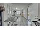 Grooming room featuring tiled floors, mirrors and grooming table at 126 Ridgewood Ave, Brandon, FL 33510
