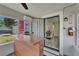 The interior shot reveals a reception area with a wooden counter and an open doorway to another room at 126 Ridgewood Ave, Brandon, FL 33510