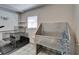 Pet grooming station with stainless tub and tiled floor, providing a clean space to pamper your furry friends at 126 Ridgewood Ave, Brandon, FL 33510