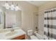 Functional bathroom with a combined shower and tub, vanity, and toilet at 12831 White Bluff Rd, Hudson, FL 34669