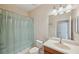 Bathroom featuring a shower-tub combo, a toilet, and a vanity with modern fixtures at 12831 White Bluff Rd, Hudson, FL 34669