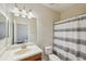 Functional bathroom with a combined shower and tub, vanity, and toilet at 12831 White Bluff Rd, Hudson, FL 34669